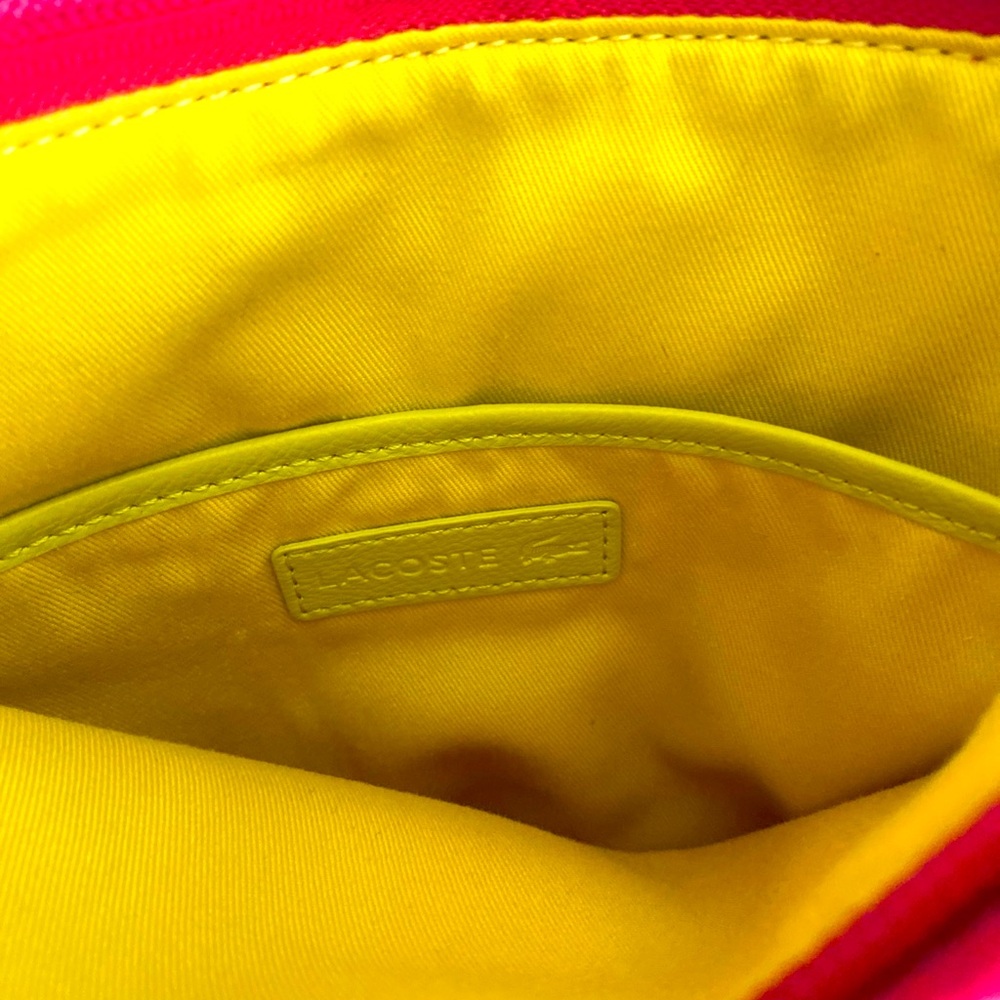 I’m selling a red vintage Lacoste bag if your interested contact me